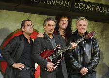 Famous buskers practice at Tottenham Court Road - promoting their new musical 'We will Rock You'!
